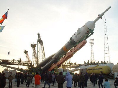 Soyuz launcher is moved into the upright position on the launch pad