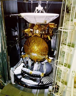 Technicians fit Huygens to Cassini before starting tests