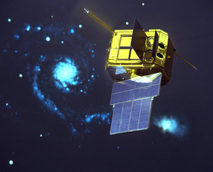 Model of ESA's Exosat X-ray satellite with the Whirlpool Galaxy as a backdrop