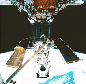 An EVA during STS-82, a servicing mission for the Hubble Space Telescope (HST)