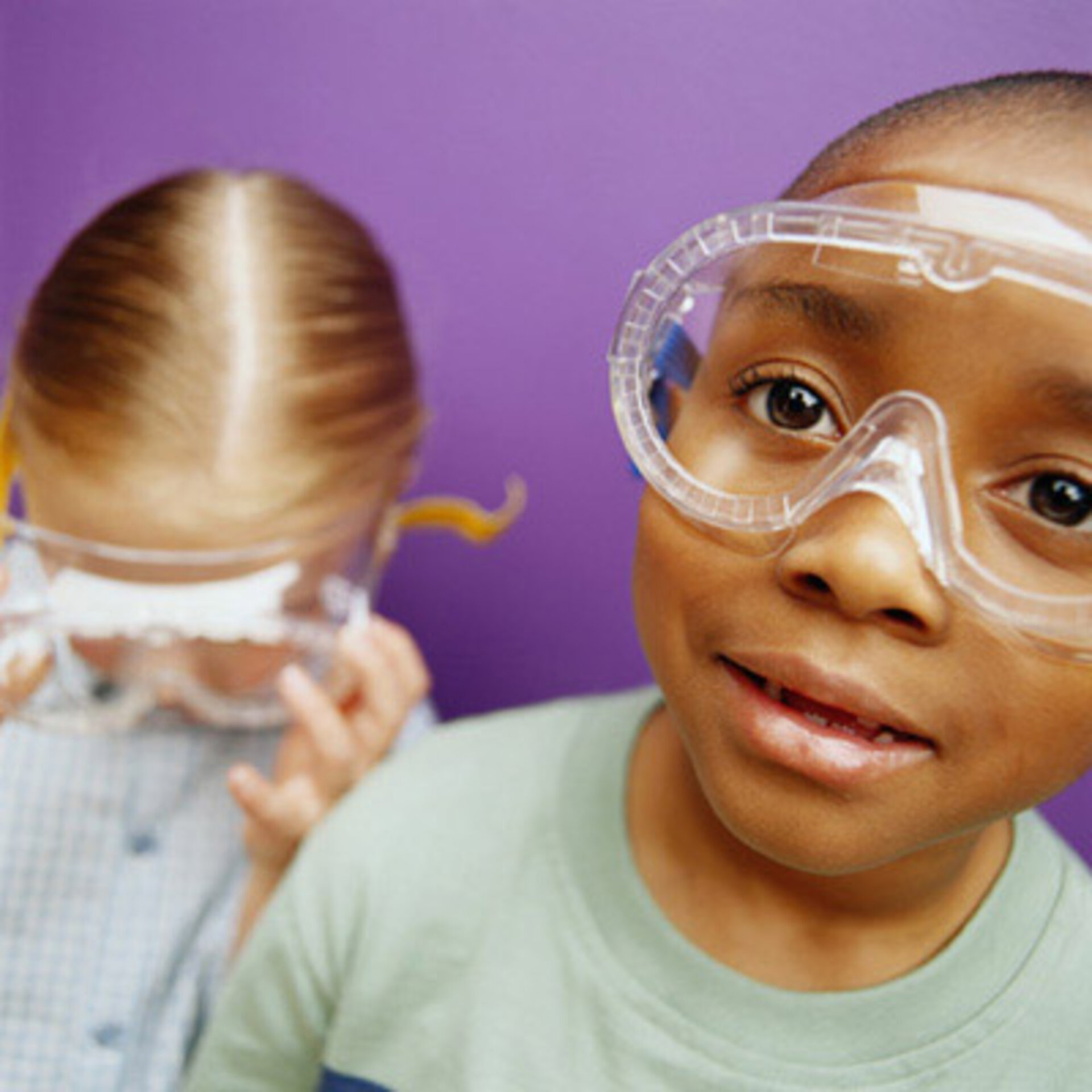 Children wear protective goggles