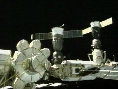 Soyuz TMA-3 (right) docked with ISS next to the Soyuz TMA-2
