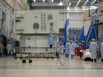 The Jules Verne Equipped Avionics Bay flight hardware is removed from its container box after arrival from Toulouse