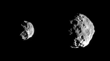 Cassini's flyby of Phoebe shows a moon with a battered past