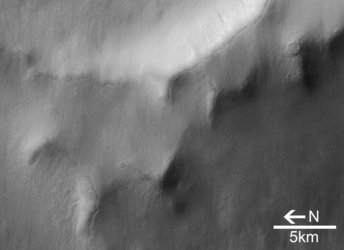 Close-up view of crater and Martian dunes