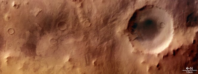 Colour view of impact crater in Promethei Terra