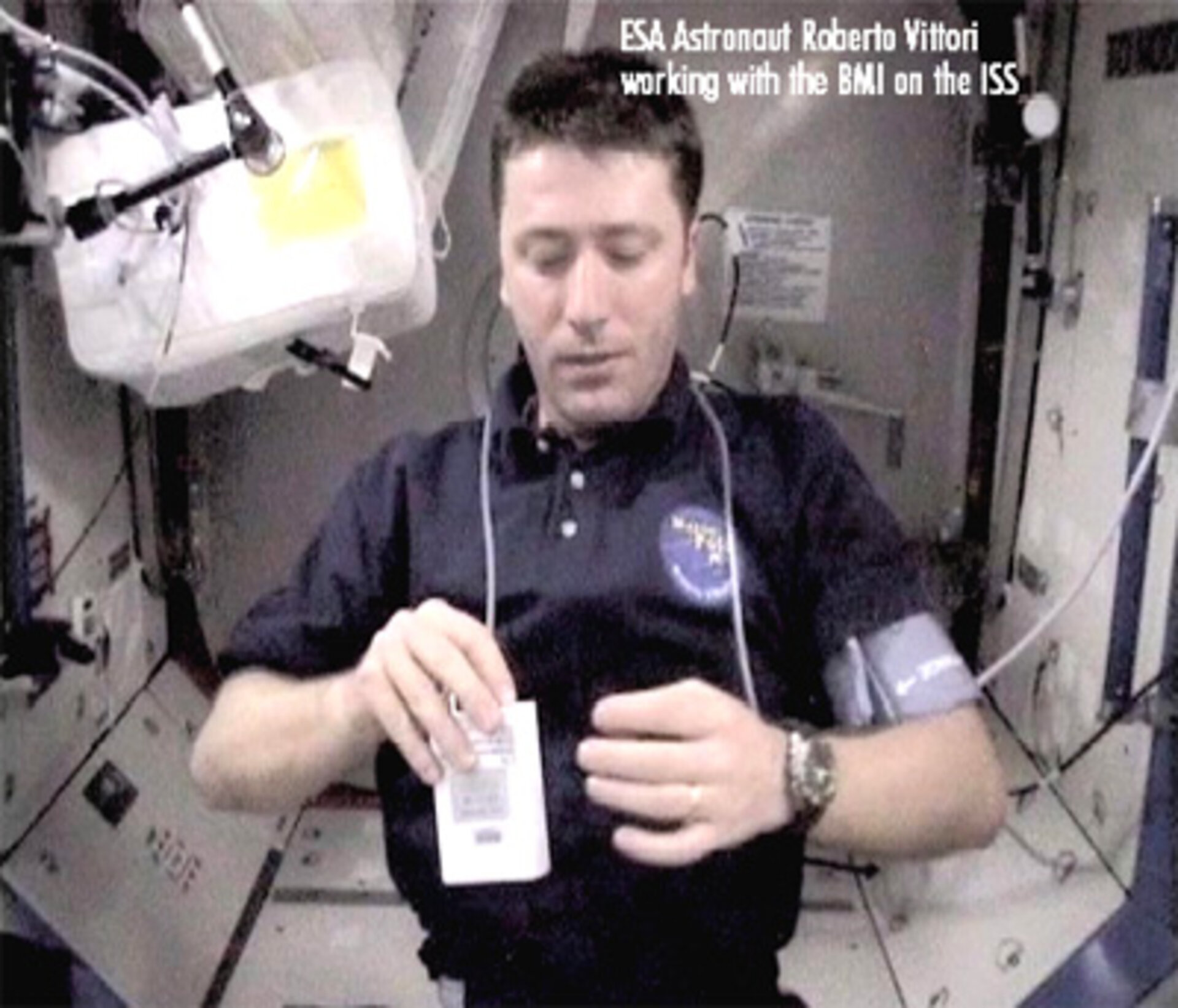 ESA astronaut Roberto Vittori working with the BMI on the ISS