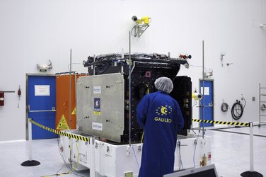 ESA expert inspecting GIOVE-A in clean room