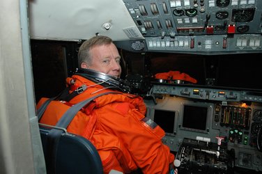 STS-121 Commander Steven Lindsey seated in the cockpit of the Shuttle Training Aircraft (STA)