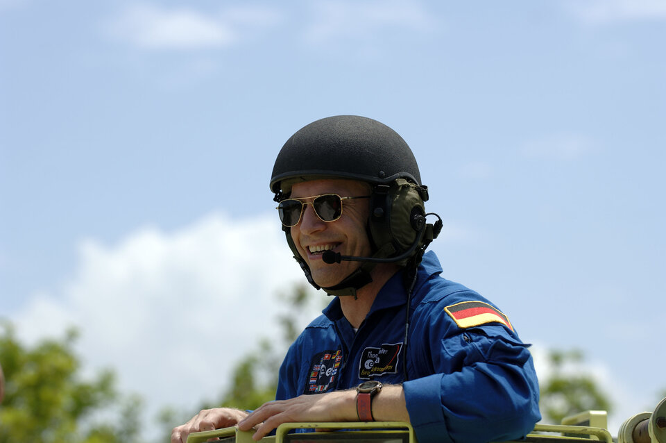 Thomas Reiter driving M-113 armoured personel carrier at KSC