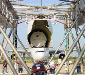 Transport container carrying Columbus laboratory is removed from Beluga aircraft at NASA's Kennedy Space Center