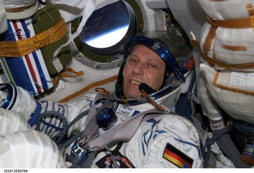 Thomas Reiter participates in couch fit check in Soyuz TMA-8