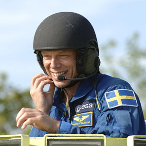 ESA astronaut Christer Fuglesang practices driving an emergency evacuation vehicle