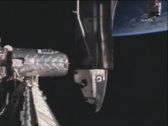 Discovery docked with the ISS at 23:12 CET (22:12 UT)