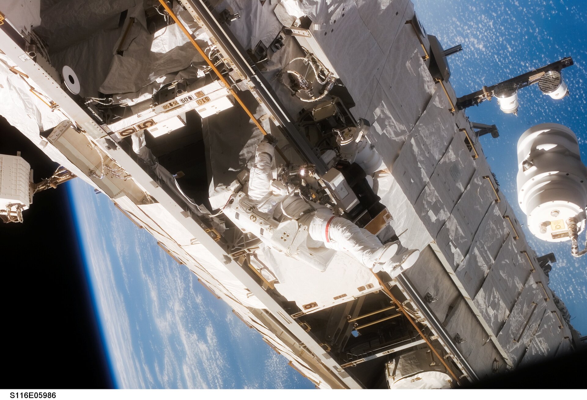 NASA astronaut Robert Curbeam during the first spacewalk of the STS-116 mission