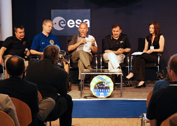 ISS Expedition 13 and 14 during a press conference at EAC