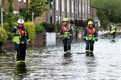 Rescue workers evacuate residents in Oxford