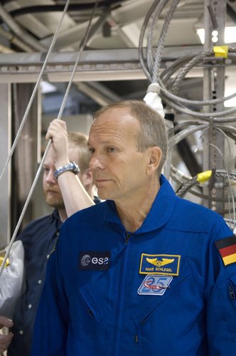 ESA astronaut Hans Schlegel during inspection of Space Shuttle Atlantis
