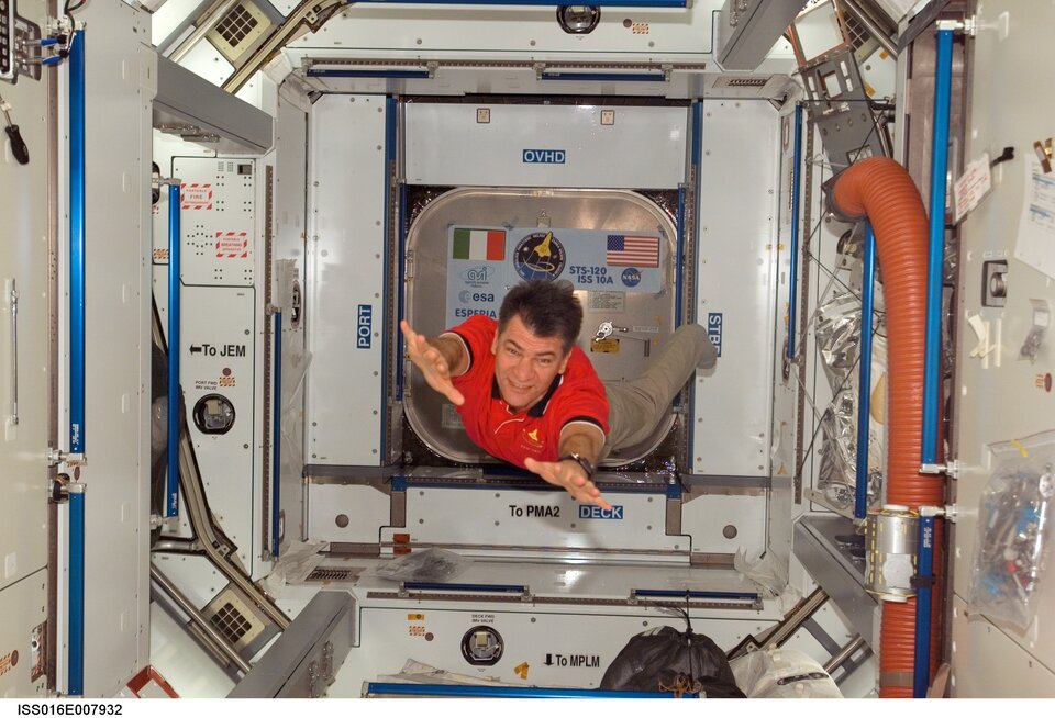 ESA astronaut Paolo Nespoli floats inside Harmony during the STS-120 mission