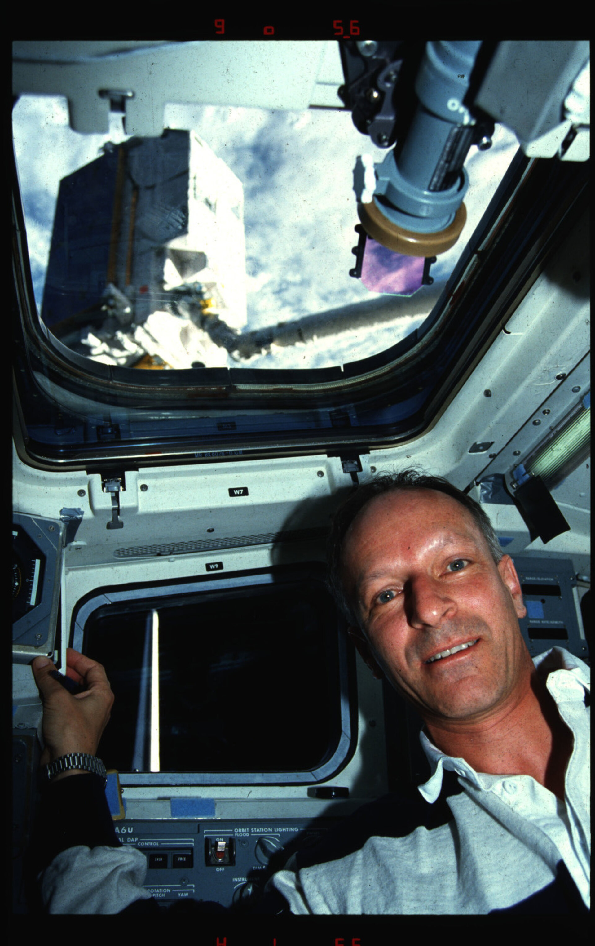 Claude Nicollier on Atlantis flight deck during Eureca deployment