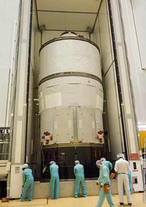 Jules Verne ATV is moved out of container in the Final Assembly Building at Europe's Spaceport in Kourou