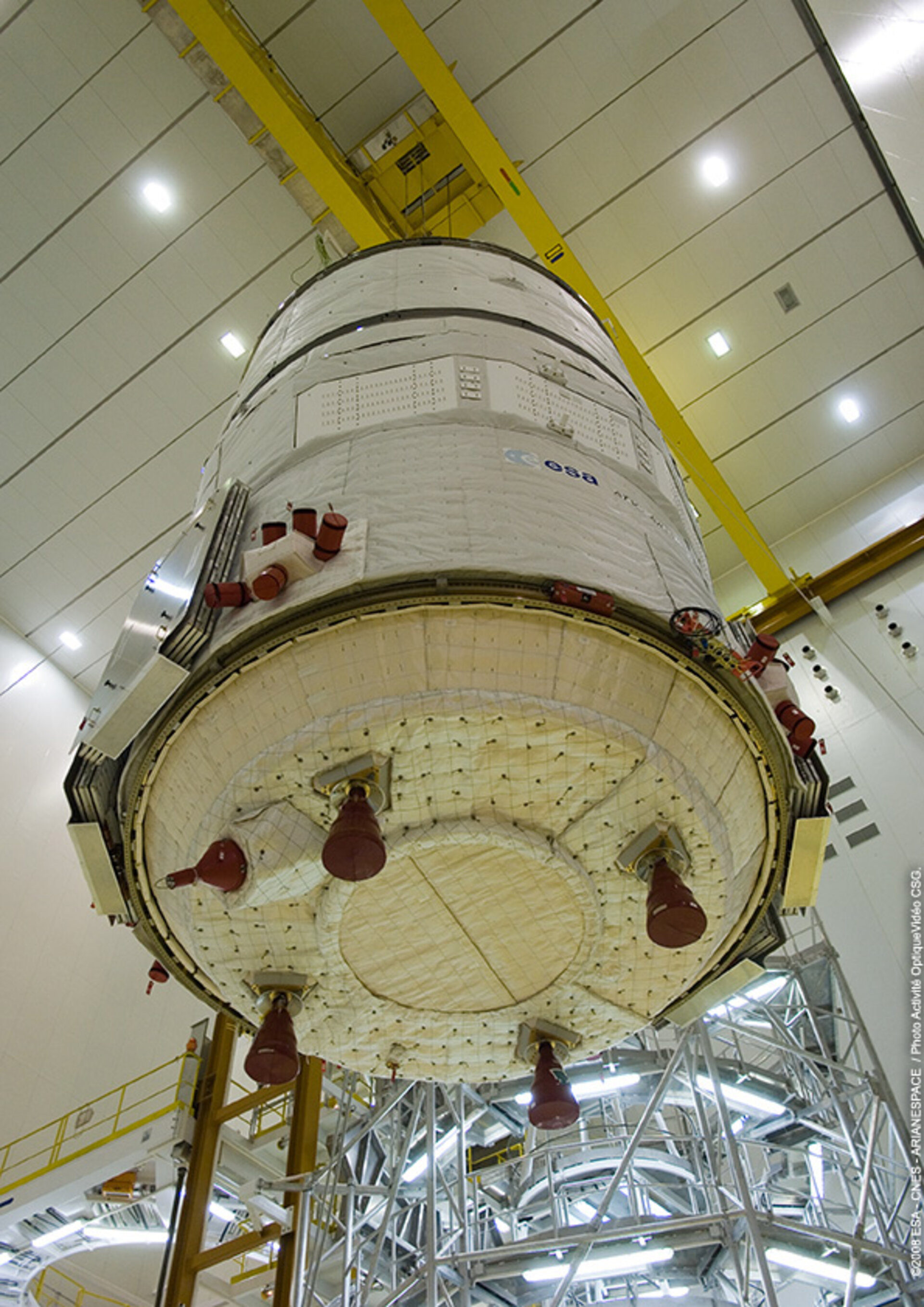 Service Module being hoisted for mating with the Integrated Cargo Carrier