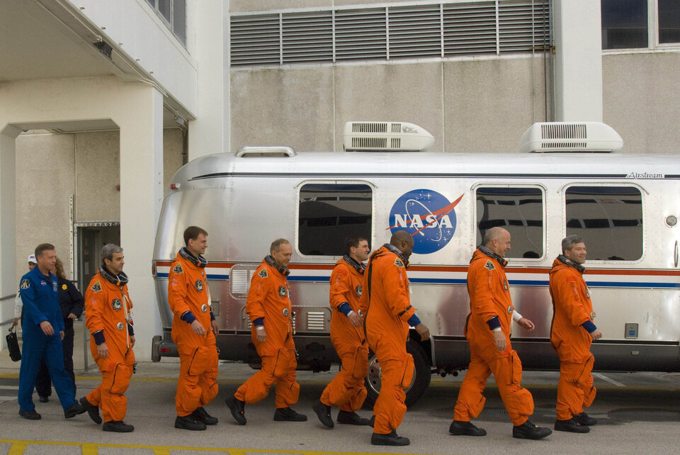 STS-122 crew during walk out