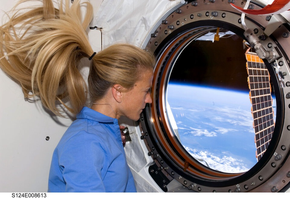 Karen enjoys the view in space