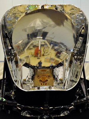 Herschel reflected in Planck’s primary mirror