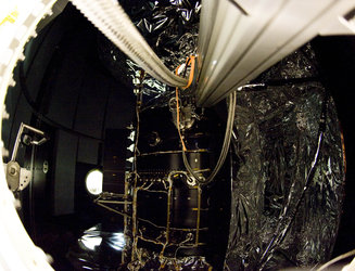 A peek at the Herschel cryostat through the fairing