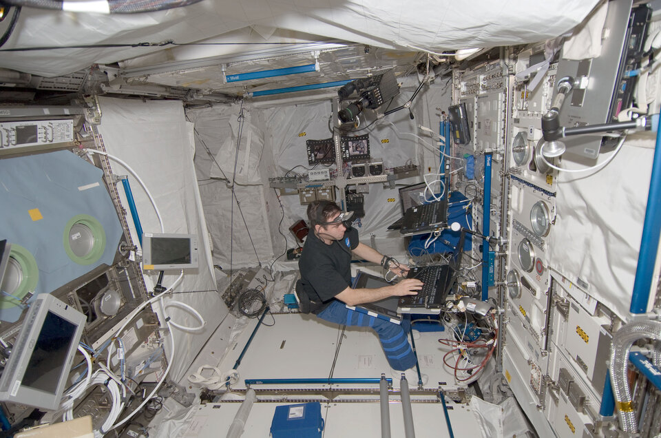 Astronaut in the European Columbus laboratory