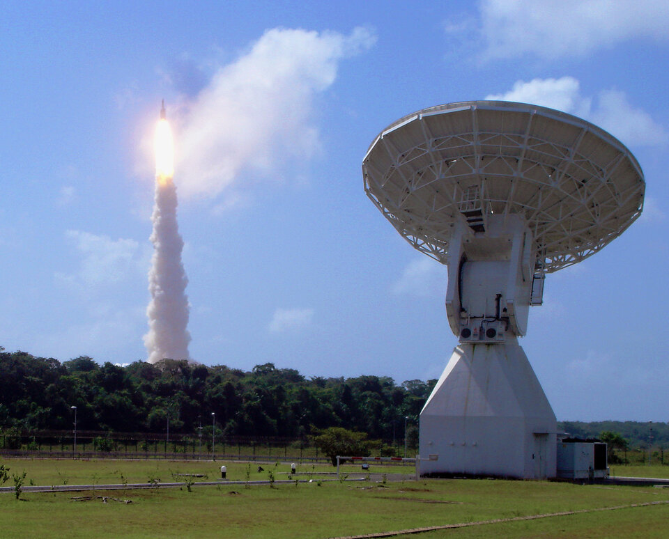 The Ariane 5 V188 launcher carrying Herschel and Planck rises above ESA’s 15 m-diameter tracking dish at Kourou, French Guiana, on 14 May 2009.