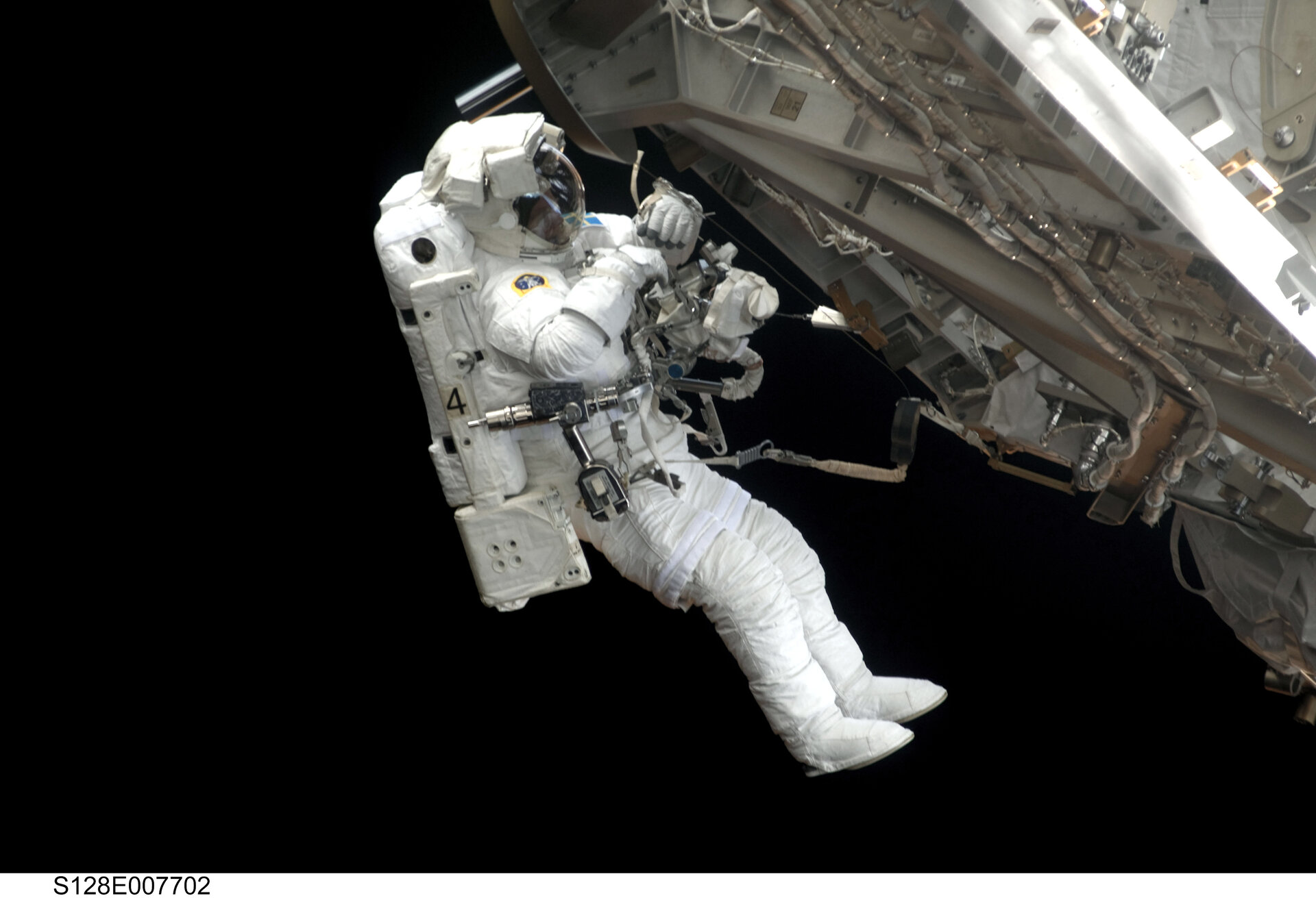 Christer Fuglesang participates in the third STS-128 spacewalk outside the ISS