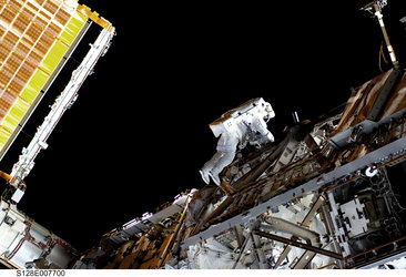 Christer Fuglesang participates in third STS-128 spacewalk outside the ISS