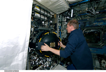 ESA astronaut Frank De Winne at work in the Destiny laboratory