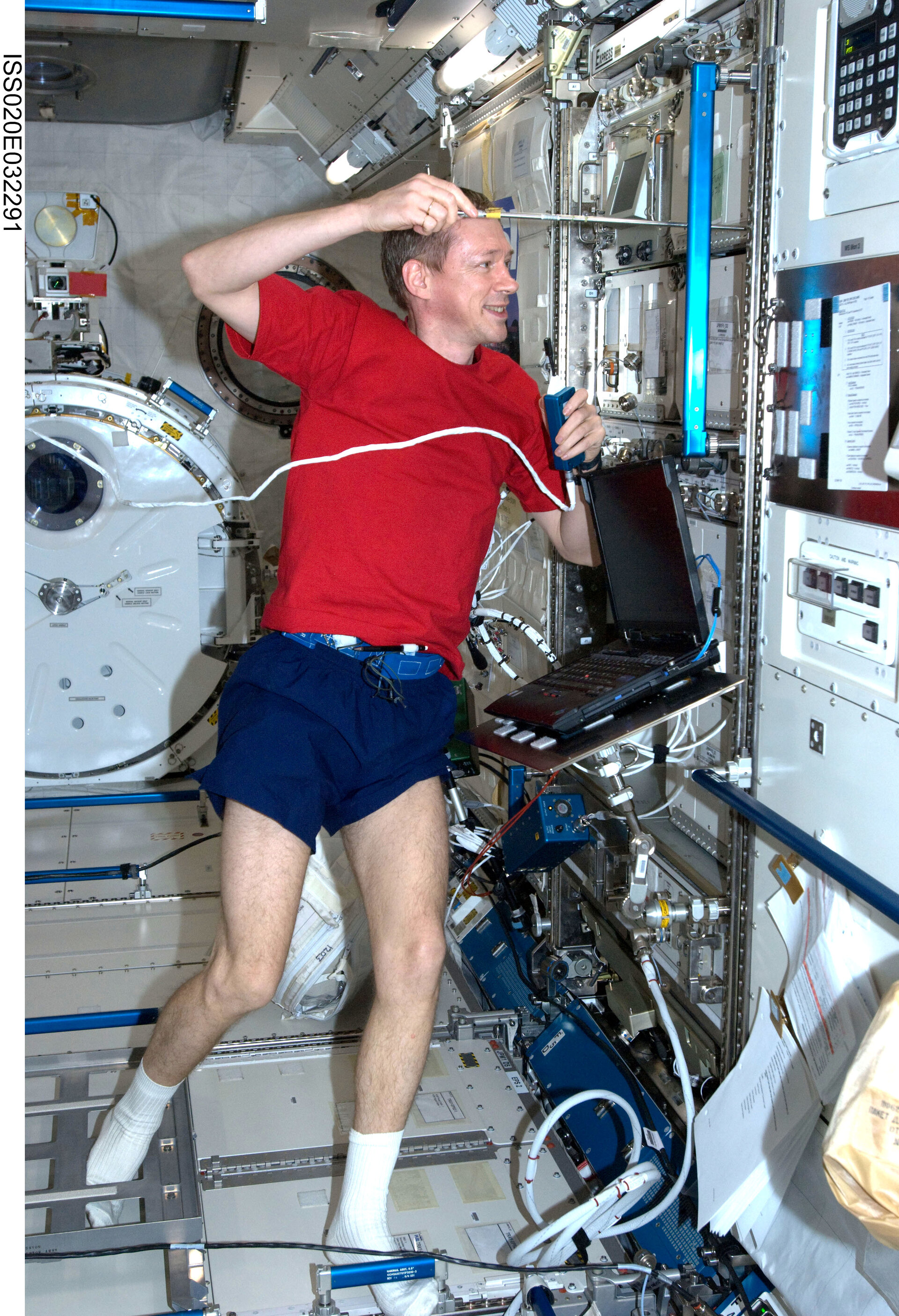 ESA astronaut Frank De Winne works in the Japanese Kibo laboratory