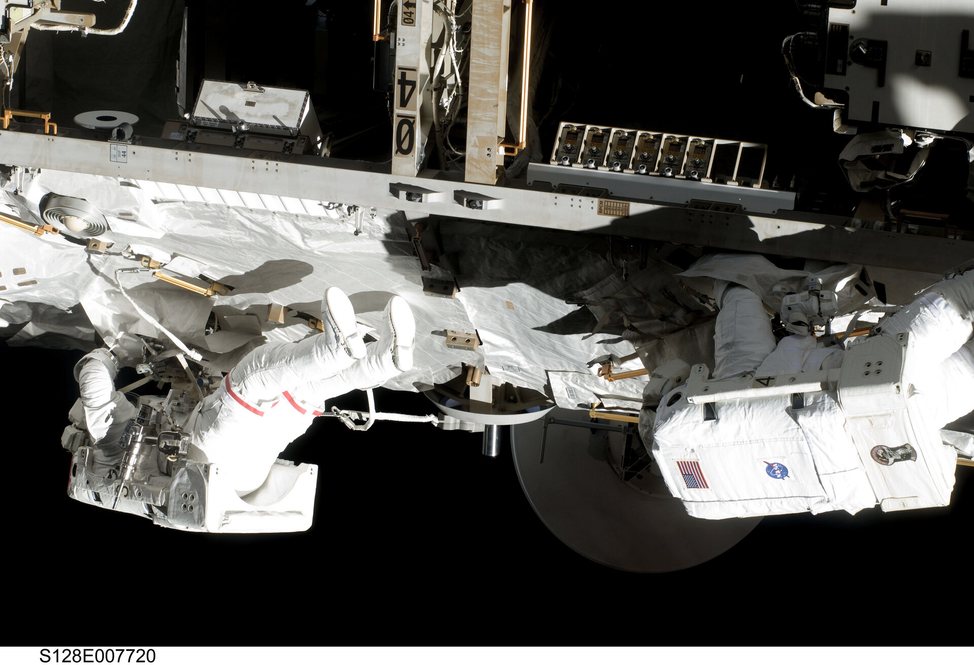 Fuglesang and Olivas participate in the third STS-128 spacewalk outside the ISS