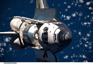 Space Shuttle Discovery before docking with the ISS