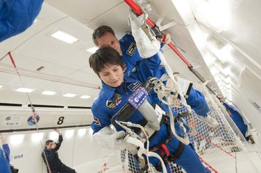 Samantha Cristoforetti testing a space suit gloves