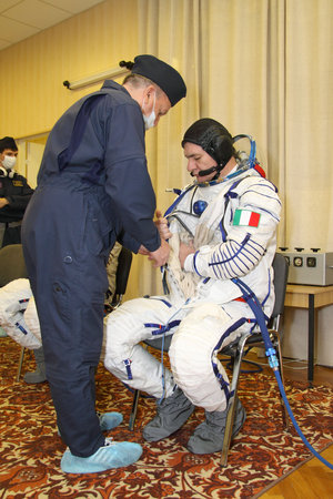 Paolo Nespoli participates in preflight fit checks and other preparations