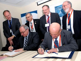 Signing the cooperation agreement in Tel Aviv
