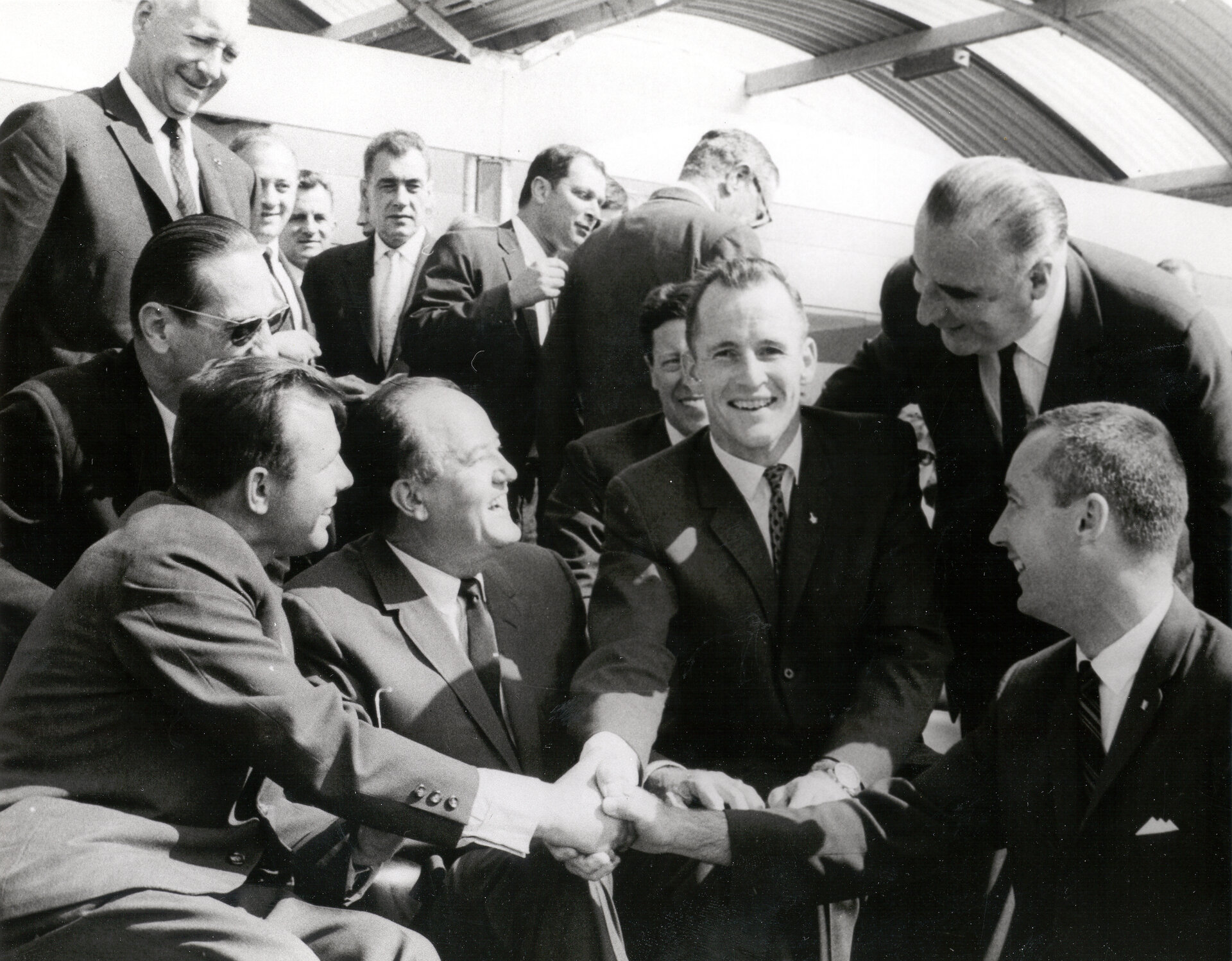 Gagarin met with astronauts Ed White and James McDivitt at the Paris Air Show in 1965.