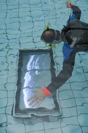 AquaCinema’s monitor shows space view in pool