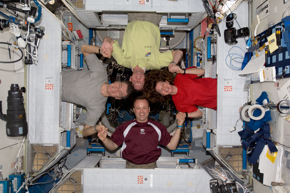 Astronauts posing in the Harmony node
