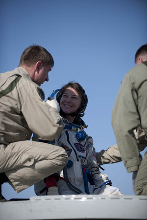 Catherine having a pause on the hatch of the Soyuz