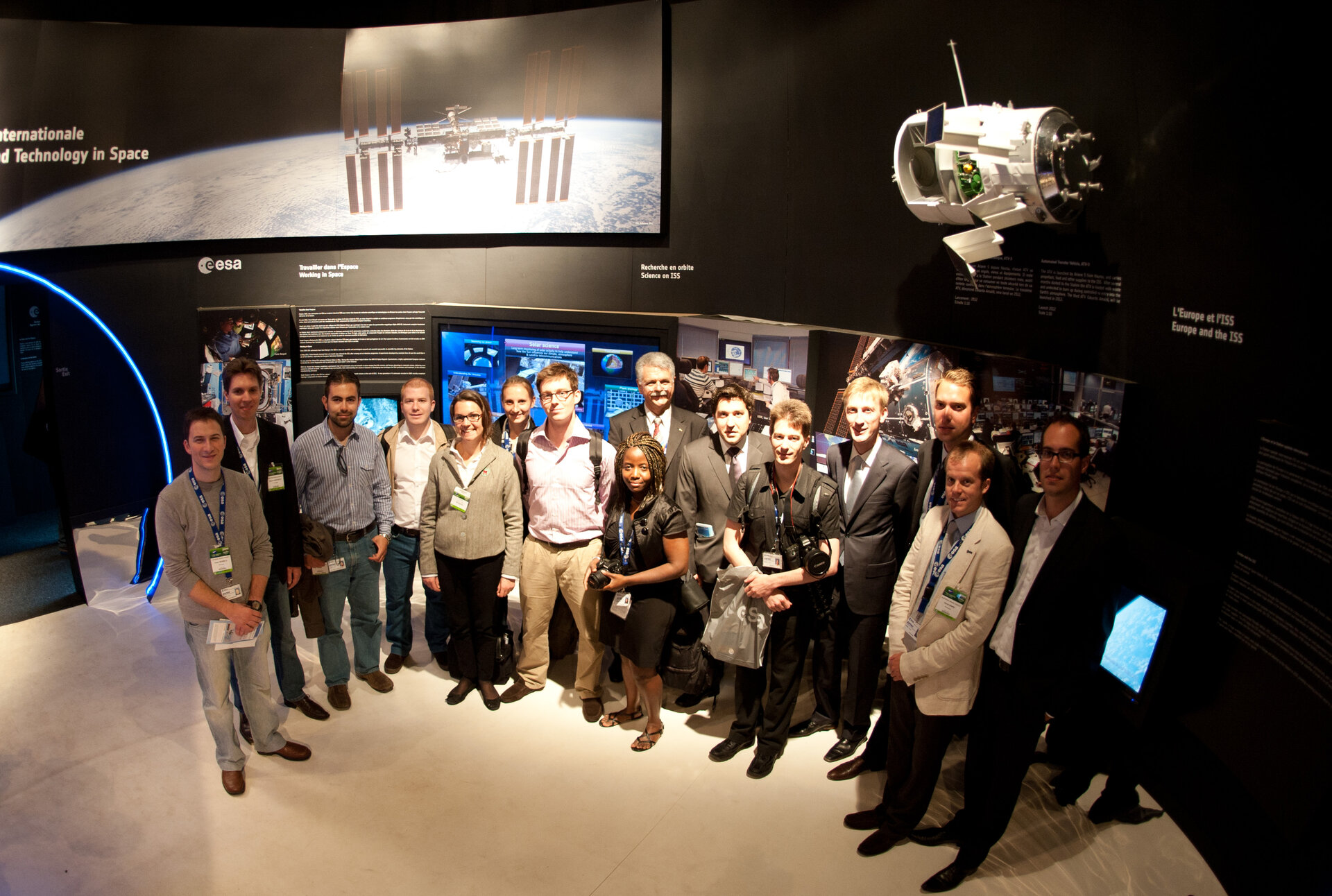 "Young ESA" staffs and Franco Bonacina visit the ESA pavilion