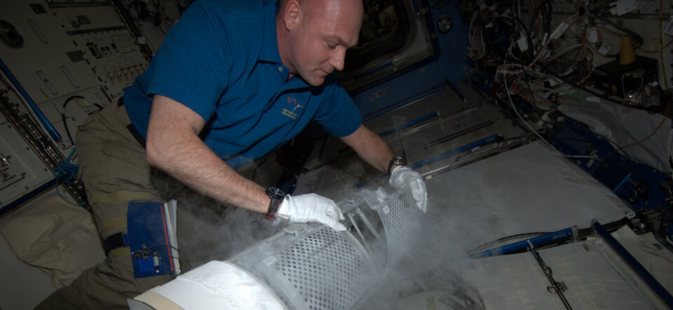 ESA astronaut André Kuipers freezing blood samples
