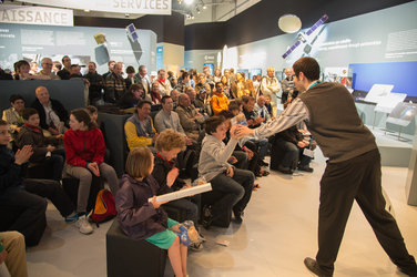 Public during a space quiz at ESA pavilion