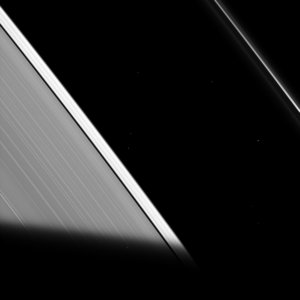 The shadow of Saturn cuts across the rings in this recent Cassini image. 