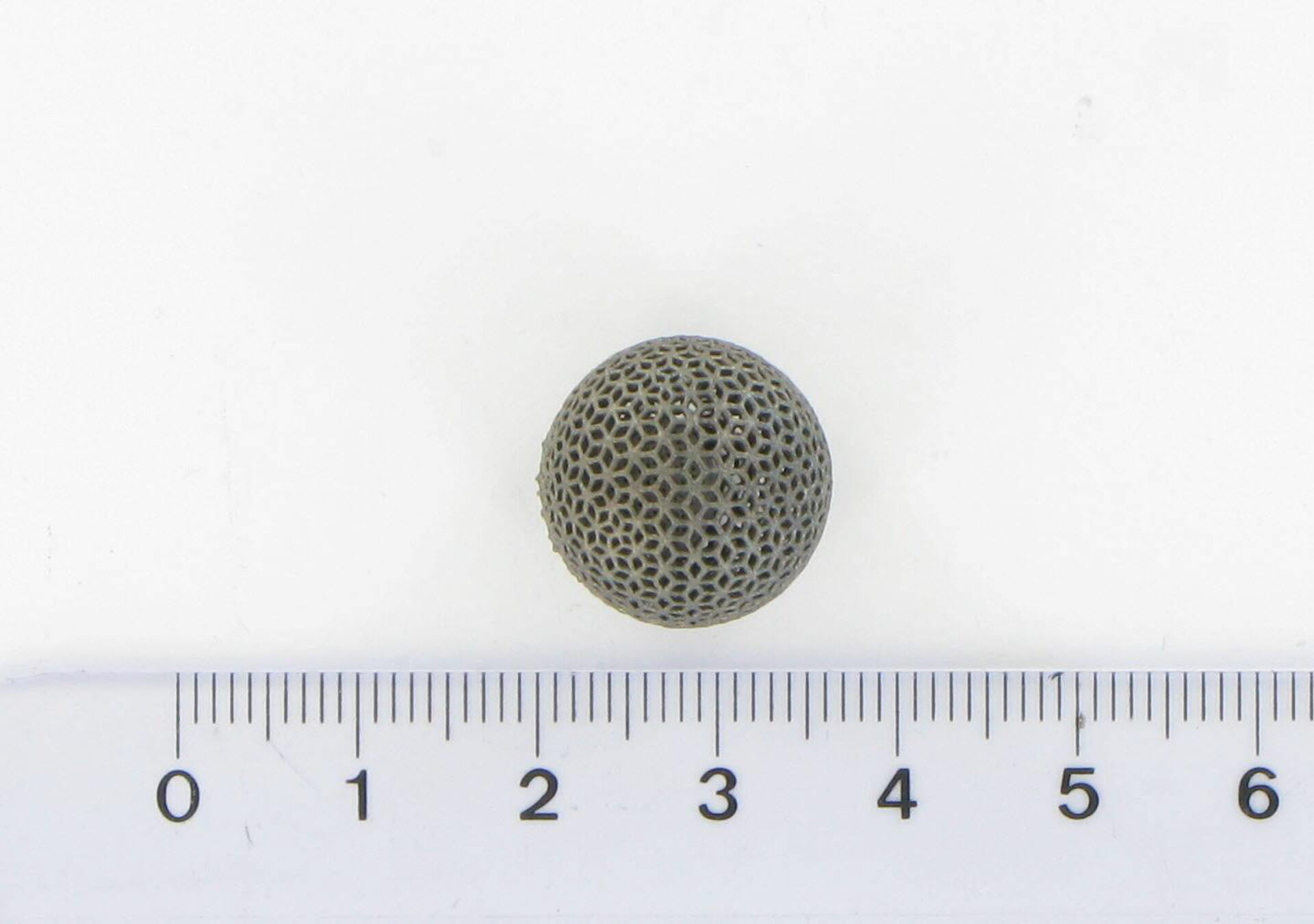 3D-printed titanium lattice ball